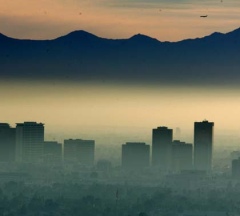 A brown cloud of pollution over Phoenix, Arizona. Brown clouds of aerosol pollutant particles could be overwhelming the expected changes in rainfall arising from increasing greenhouse gas levels in the air. Credit: Flick/Flickr