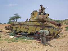 Researchers are hoping to work out how climate change affects risk of conflicts, such as the one in Somalia in which this tank was destroyed. Image credit: Carl Montgomery, via Flickr Creative Commons license