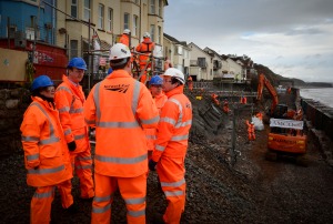 UK Prime Minister David Cameron visiting Dawlish a week after the storms that demolished the sea wall that supported the train line. Image copyright Number 10, used via Flickr Creative Commons license. 